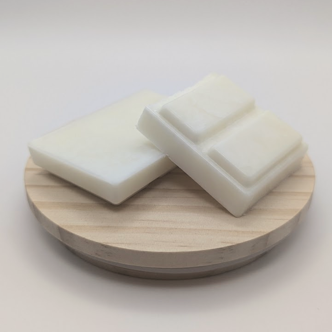 A wax melt bar broken against a white background.