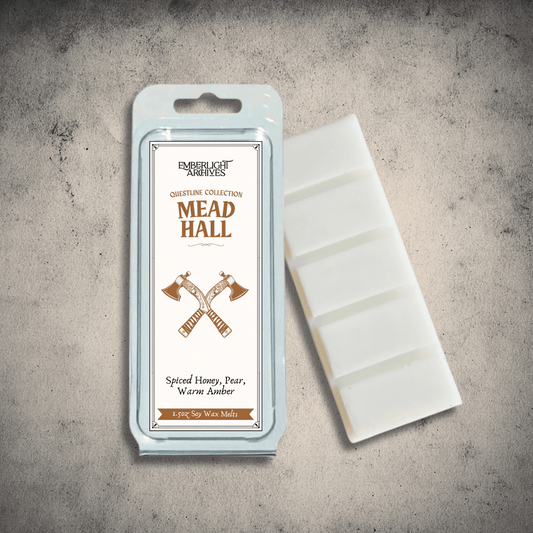 Emberlight Archives Mead Hall wax melt bar with a tan label against a gray stone background, Pear and Spiced Honey scent.