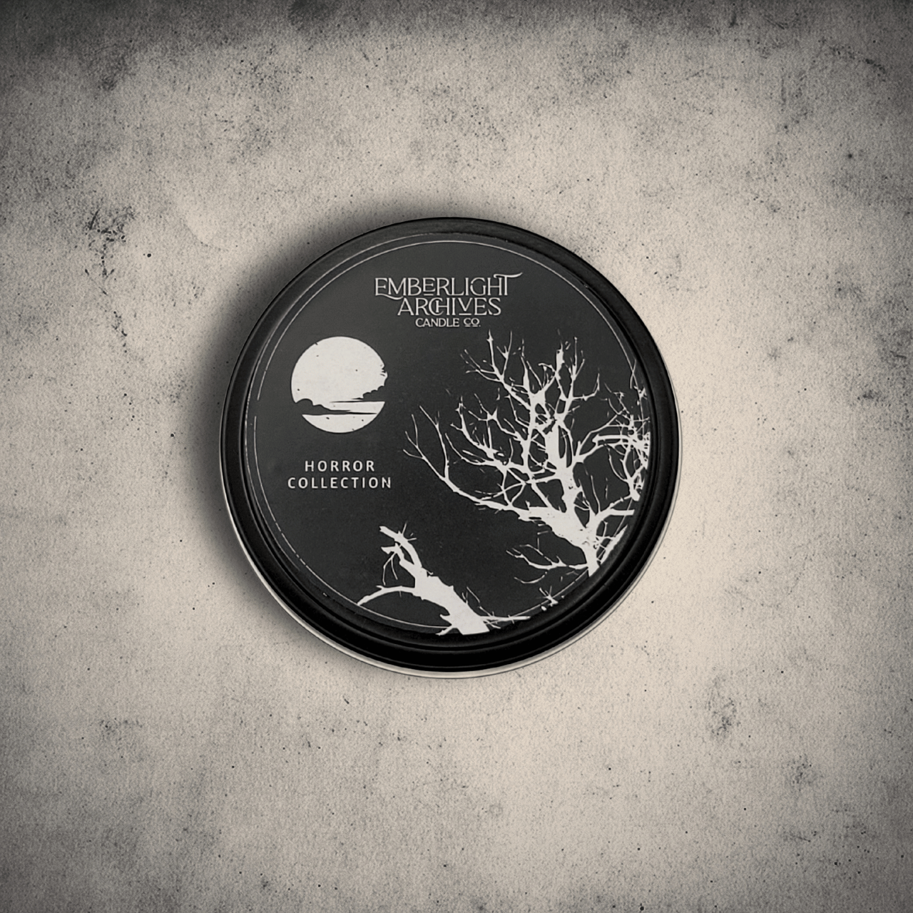 Example of black lid for Horror Collection 8oz candle tins.