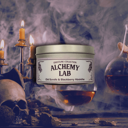 8oz Alchemy Lab candle by Emberlight Archives in a silver tin against a potions background, Old Scrolls and Blackberry Absinthe scent.