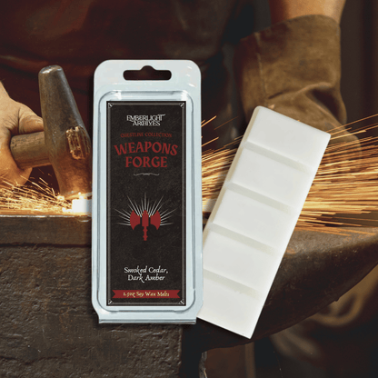 Weapon's Forge wax melt bar by Emberlight Archives with a black label against a anvil background, Amber and Cedar scent.