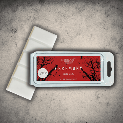 Emberlight Archives Ceremony wax melt bar with a red label against a gray stone background, Incense scent.