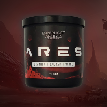 9oz Ares candle by Emberlight Archives in a black glass jar with illustrated red planet label against a red background, Leather and Balsam scent.