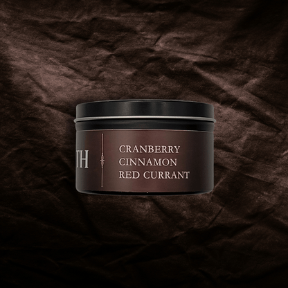 Dark red container with 'Cranberry Cinnamon Red Currant' text on a textured red background
