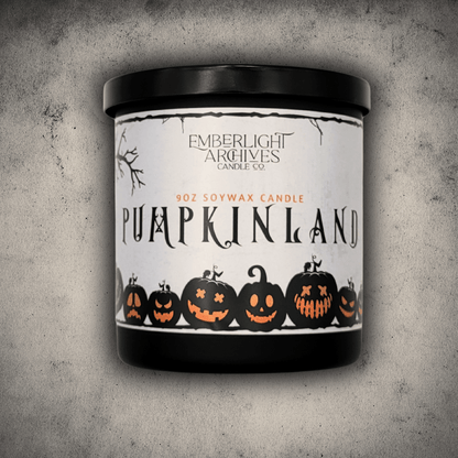 Emberlight Archives Pumpkinland candle in a 9oz black glass jar with pumpkin label against a gray stone background, Pumpkin Pie scent.