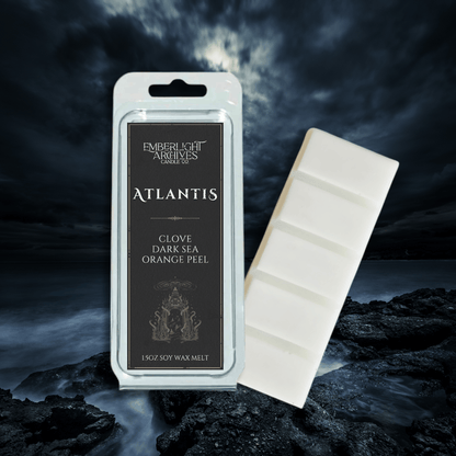 Atlantis wax melt bar by Emberlight Archives with a black label against a ocean background, Clove & Orange Peel scent.