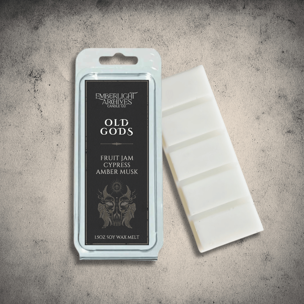 Emberlight Archives Old Gods wax melt bar with a black label against a gray stone background, Fruit Jam & Musk scent.